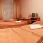 Гостиница Гостиничный комплекс Гранат, Трёхместный совместный номер с 3 кроватями и общей ванной комнатой, фото 11